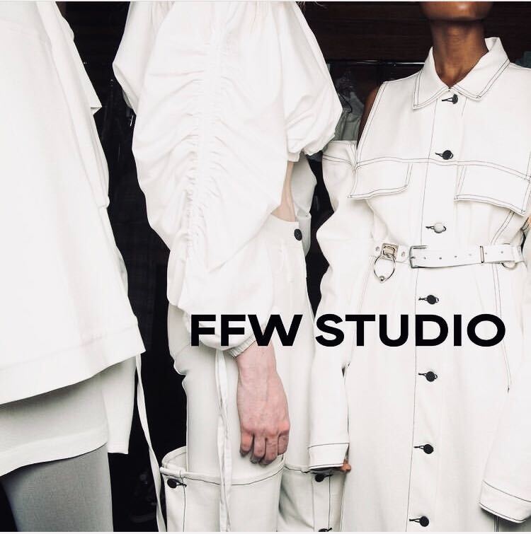Three models in white outfits with the heading FFW Studio